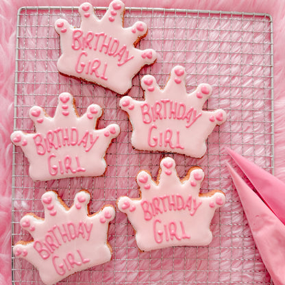  Hand baked dog birthday treats decorated with dog friendly icing.